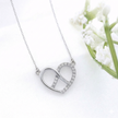 14k Gold 0.06ctw Diamond Infinity Heart Necklace