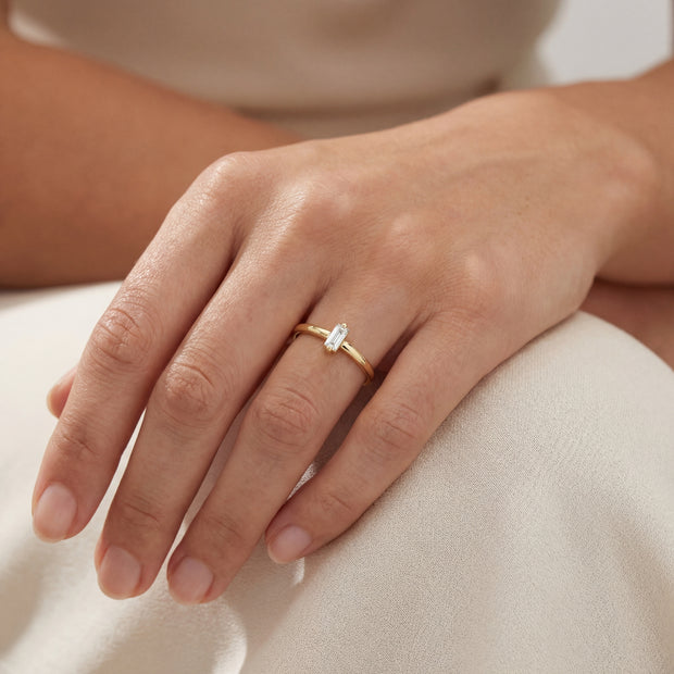 10k Yellow Gold with .10Ctw Natural Baguette White Diamond Solitaire Ring