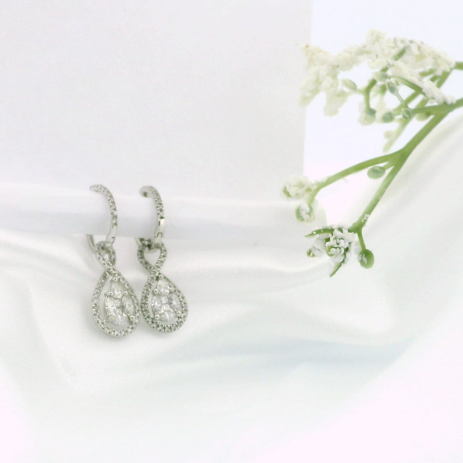 14k White Gold Diamond Hoop Earrings with Oval Swirl Dangle