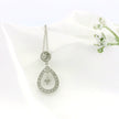 10k White Gold Round and Teardrop Charm Necklace with Dangling Star